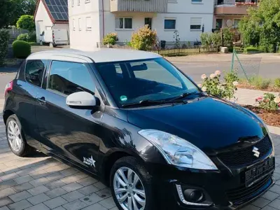Gebraucht Suzuki Swift 94 PS (69 kW) 2014 Schwarz Kleinwagen