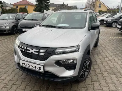 Gebraucht Dacia Spring Essentiel 33 kW (45 PS) 2023 Lightninggrau Kleinwagen