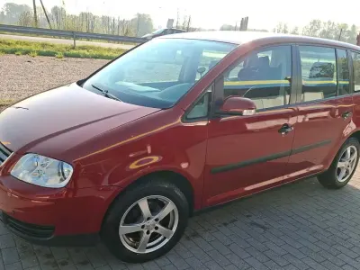 Używany VW Touran 101 KM (74 kW) 2003 Czerwony Minivan
