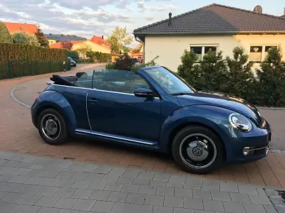 Używany VW Beetle 110 KM (80 kW) 2016 Niebieski Hatchback