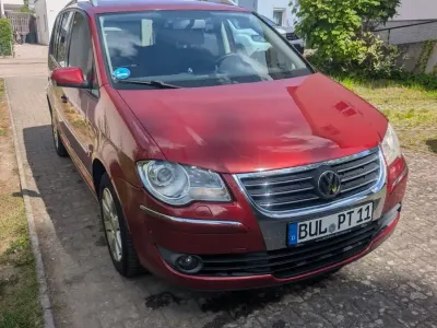 Używany VW Touran 140 KM (102 kW) 2007 Czerwony Minivan