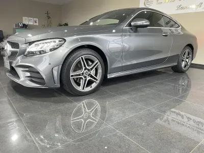 Gebraucht Mercedes C180 AMG line 156 PS (114 kW) 2019 Selenitgrau  metalliclack Coupé