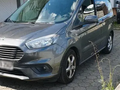 Gebraucht Ford Tourneo Courier Ambiente 101 PS (74 kW) 2018 Grau Van / Kleinbus