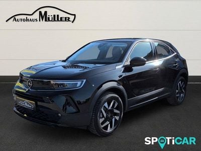 Gebraucht Opel Mokka-e Elegance 100 kW (136 PS) 2024 Lackierung schwarz perla nera/ SUV