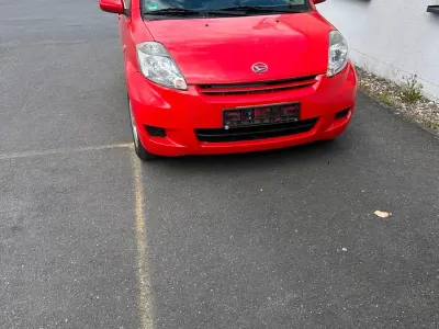 Gebraucht Daihatsu Sirion 69 PS (50 kW) 2010 Rot Kleinwagen