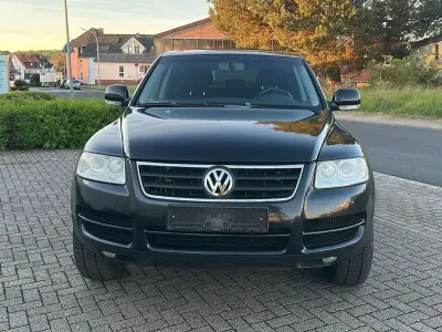 Second-hand VW Touareg R 174 CP (127 kW) 2006 Negru SUV