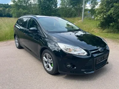 Gebraucht Ford Focus 125 PS (91 kW) 2014 Schwarz Kombi