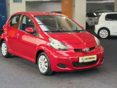 Gebraucht Toyota Aygo Cool 68 PS (50 kW) 2011 Red mica metallic / wildfire Kleinwagen
