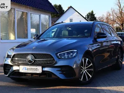 Gebraucht Mercedes E300 AMG 306 PS (225 kW) 2022 Selenitgrau (metallic) Kombi