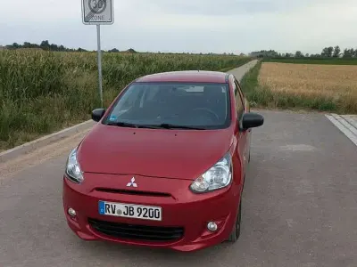 Gebraucht Mitsubishi Space Star Diamant Edition 71 PS (52 kW) 2015 Rot Kleinwagen