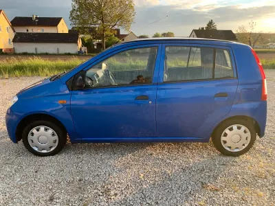 Gebraucht Daihatsu Cuore 58 PS (42 kW) 2006 Blau Kleinwagen