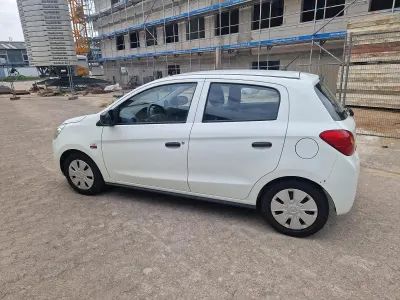 Gebraucht Mitsubishi Space Star 71 PS (52 kW) 2015 Weiß Kleinwagen