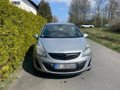 Gebraucht Opel Corsa Active 87 PS (63 kW) 2013 Silber Kleinwagen
