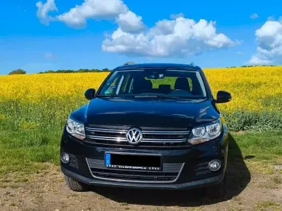 Używany VW Tiguan Sportline 122 KM (89 kW) 2012 Czarny SUV