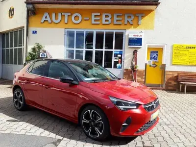 Używany Opel Corsa Elegance 101 KM (74 kW) 2023 Czerwony Hatchback