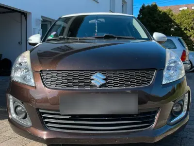 Gebraucht Suzuki Swift 94 PS (69 kW) 2015 Braun Kleinwagen