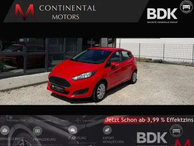 Używany Ford Fiesta Trend 101 KM (74 kW) 2013 Czerwony Sedan/Limuzyna