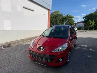 Gebraucht Peugeot 207 Premium 120 PS (88 kW) 2009 Rot Kombi