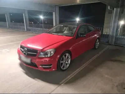 Używany Mercedes C250 204 KM (150 kW) 2013 Czerwony Coupe