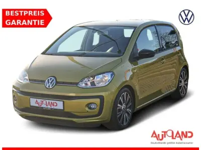 Gebraucht VW up! 75 PS (55 kW) 2019 Honey yellow metallic (metallic) Kleinwagen
