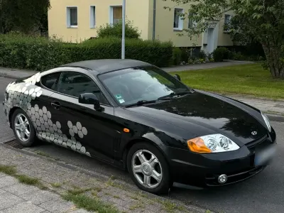 Gebraucht Hyundai Coupé 136 PS (100 kW) 2004 Schwarz Coupé