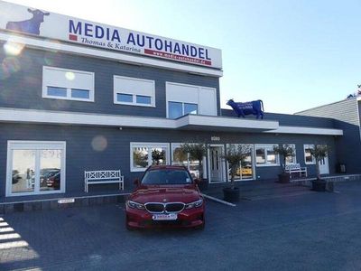 Second-hand BMW 320e Sport Line 163 CP (119 kW) 2021 Roșu Break