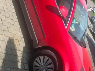 Second-hand VW Passat 130 CP (95 kW) 2004 Roșu Break
