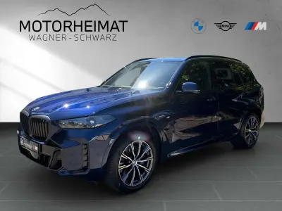Gebraucht BMW X5 M Sport 298 PS (219 kW) 2023 Bmw individual tansanitblau SUV