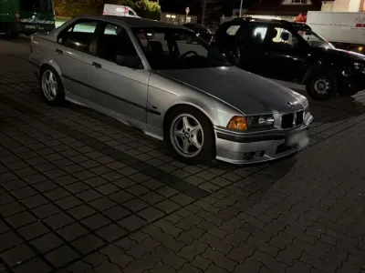 Gebraucht BMW 320 150 PS (110 kW) 1995 Silber Limousine