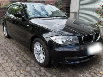 Gebraucht BMW 116 122 PS (89 kW) 2010 Schwarz Kleinwagen