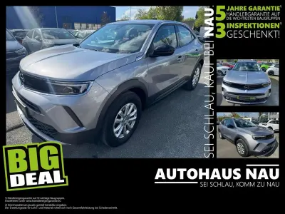 Gebraucht Opel Mokka 131 PS (96 kW) 2023 Kontrast grau/quarz silber SUV
