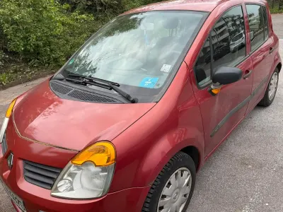 Używany Renault Modus 75 KM (55 kW) 2005 Czerwony Minivan