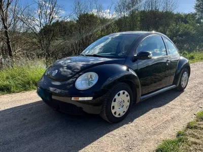 Gebraucht VW New Beetle 75 PS (55 kW) 2006 Schwarz Kleinwagen