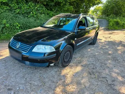 Używany VW Passat 101 KM (74 kW) 2003 Czarny Kombi