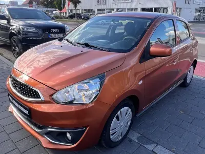 Gebraucht Mitsubishi Space Star Diamant Edition 71 PS (52 kW) 2016 Orange Kleinwagen
