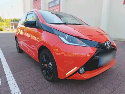 Gebraucht Toyota Aygo 69 PS (50 kW) 2014 Orange Kleinwagen