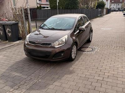 Gebraucht Kia Rio 90 PS (66 kW) 2011 Braun Kleinwagen