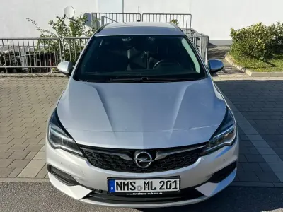 Używany Opel Astra 122 KM (89 kW) 2020 Srebrny Kombi