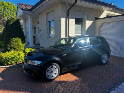 Używany BMW 116 122 KM (89 kW) 2010 Czarny Hatchback