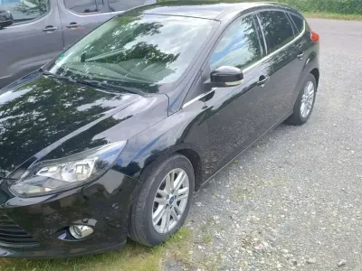 Gebraucht Ford Focus Titanium 125 PS (91 kW) 2013 Schwarz Limousine