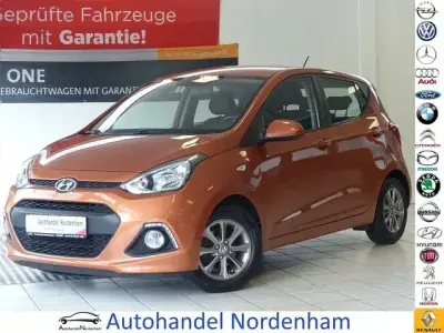 Gebraucht Hyundai i10 Intro Edition 87 PS (63 kW) 2014 New orange / mic Kleinwagen