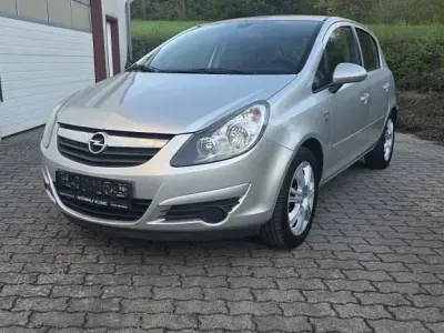 Używany Opel Corsa Edition 87 KM (63 kW) 2010 Srebrny Hatchback
