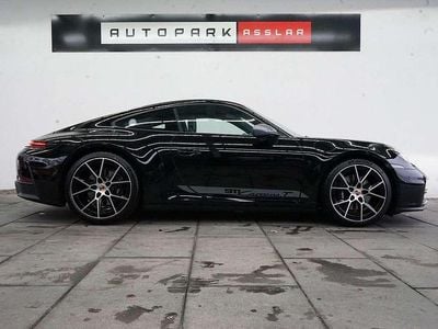 Gebraucht Porsche 911 Carrera 394 PS (289 kW) 2025 Tiefschwarz Coupé