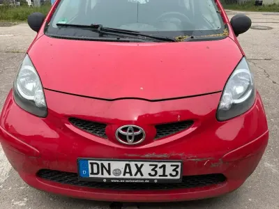 Gebraucht Toyota Aygo 67 PS (49 kW) 2007 Rot Kleinwagen