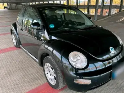 Gebraucht VW New Beetle 115 PS (84 kW) 2000 Schwarz Kleinwagen