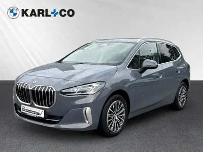 Gebraucht BMW 218 Active Tourer Luxury Line 150 PS (110 kW) 2023 Sparkling kupfergrau metallic Van / Kleinbus