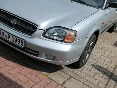 Gebraucht Suzuki Baleno 98 PS (72 kW) 1999 Silber Limousine