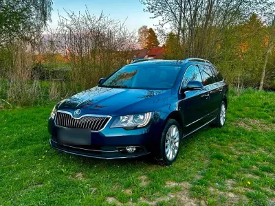 Używany Skoda Superb Ambition 140 KM (102 kW) 2014 Niebieski Kombi