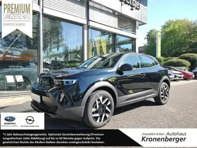 Gebraucht Opel Mokka Elegance 131 PS (96 kW) 2024 Lackierung schwarz perla nera/typ aussenverkleidung metalliclackierung SUV