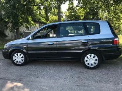 Używany Kia Carens 139 KM (102 kW) 2005 Srebrny Minivan